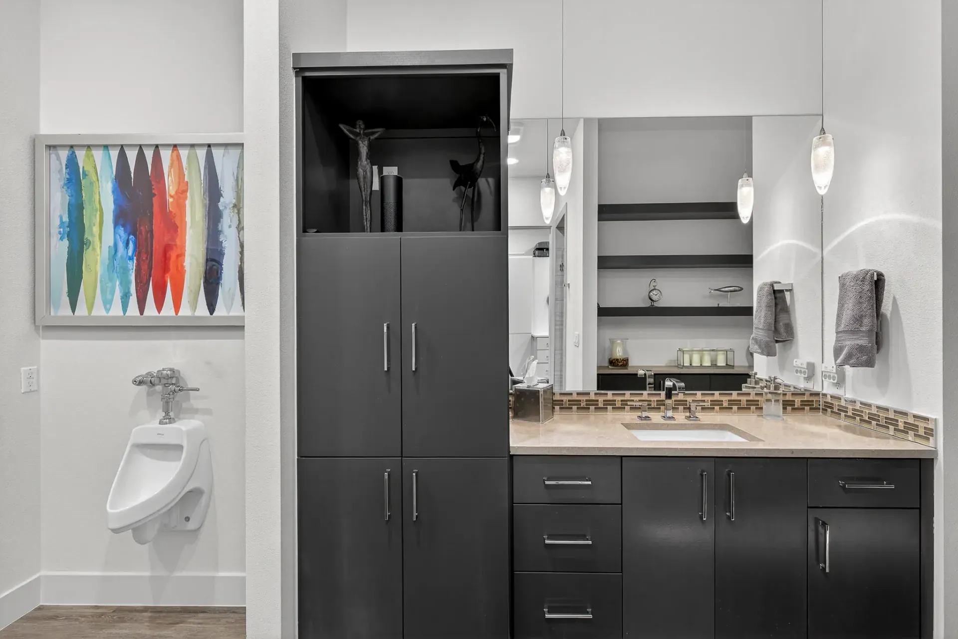 Custom bathroom with dark cabinetry